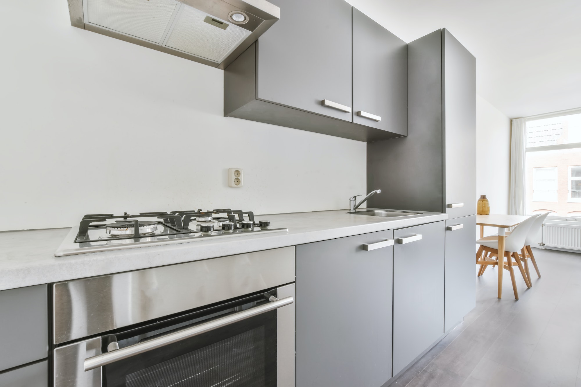 Kitchen with gray kitchen unit